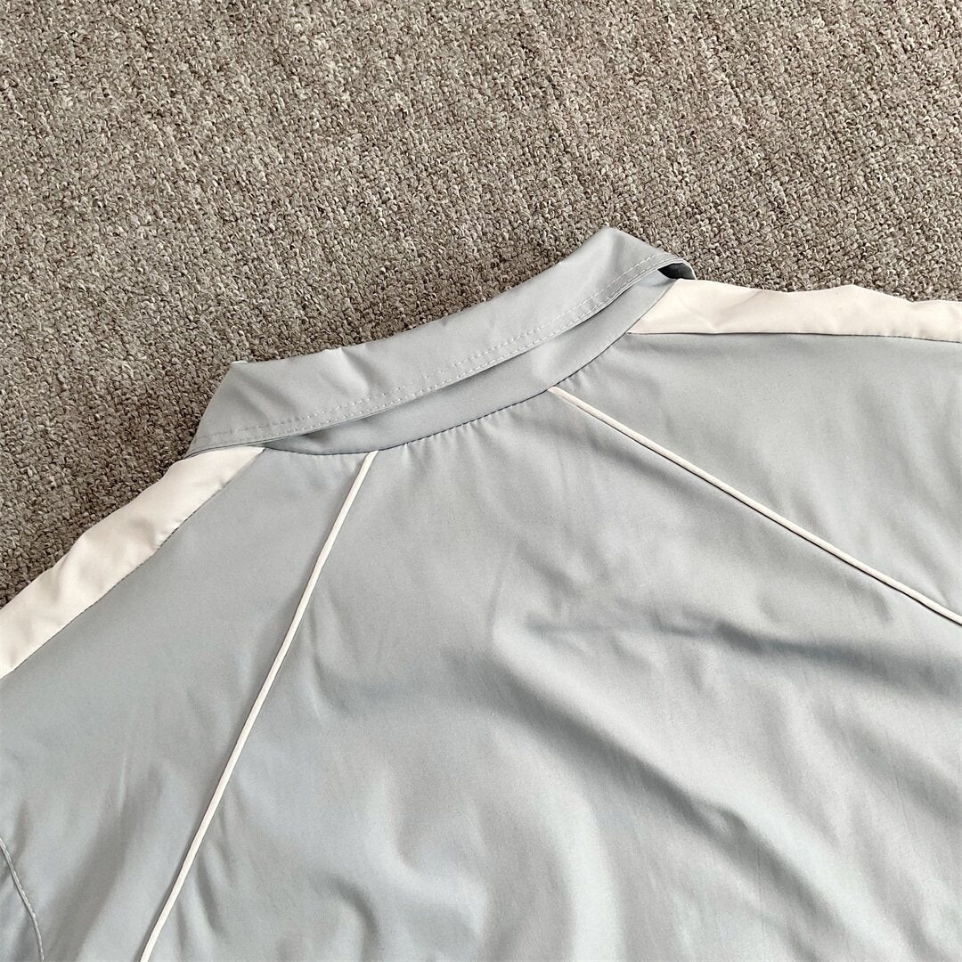 Rhude Contrasting color sportswear with zippers
