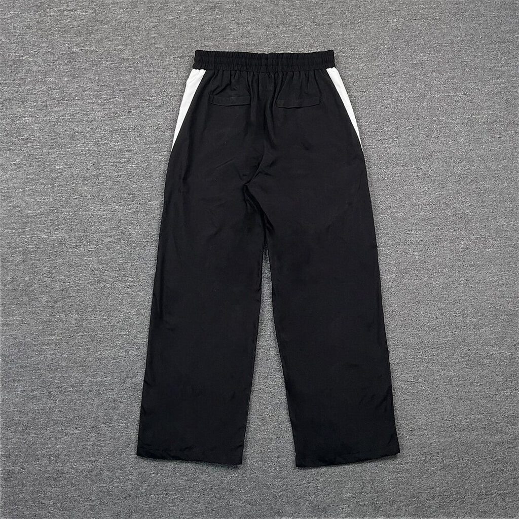 Rhude Contrasting color sportswear with zippers