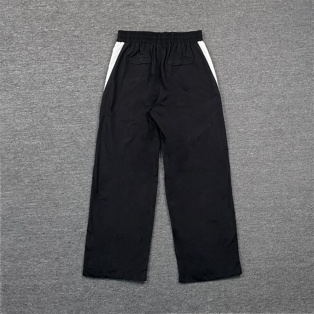 Rhude Contrasting color sportswear with zippers