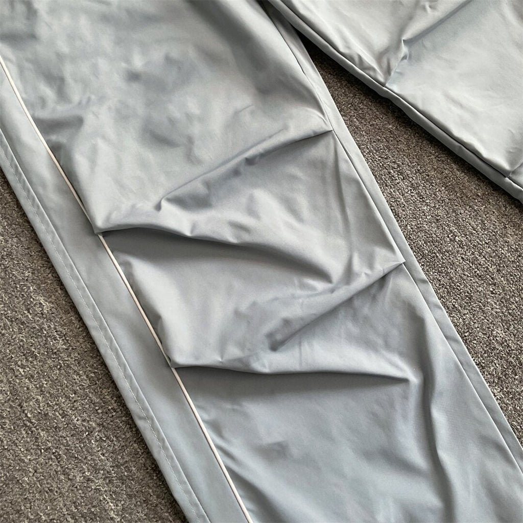 Rhude Contrasting color sportswear with zippers
