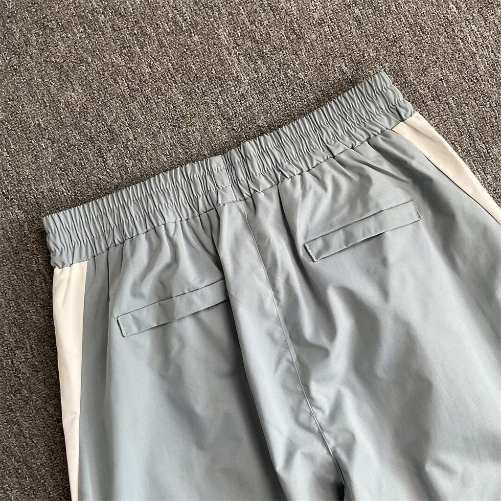 Rhude Contrasting color sportswear with zippers