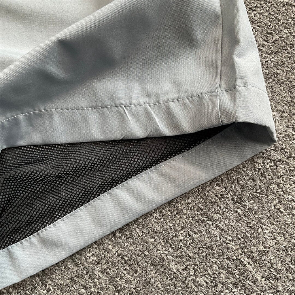 Rhude Contrasting color sportswear with zippers