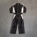 Rhude Contrasting color sportswear with zippers