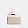 Coach Outlet Mini Skinny Id Case In Signature Canvas