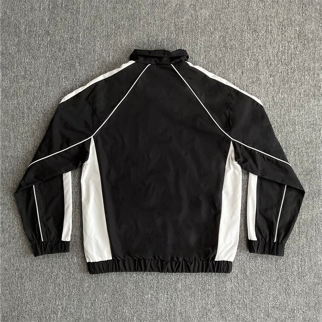 Rhude Contrasting color sportswear with zippers