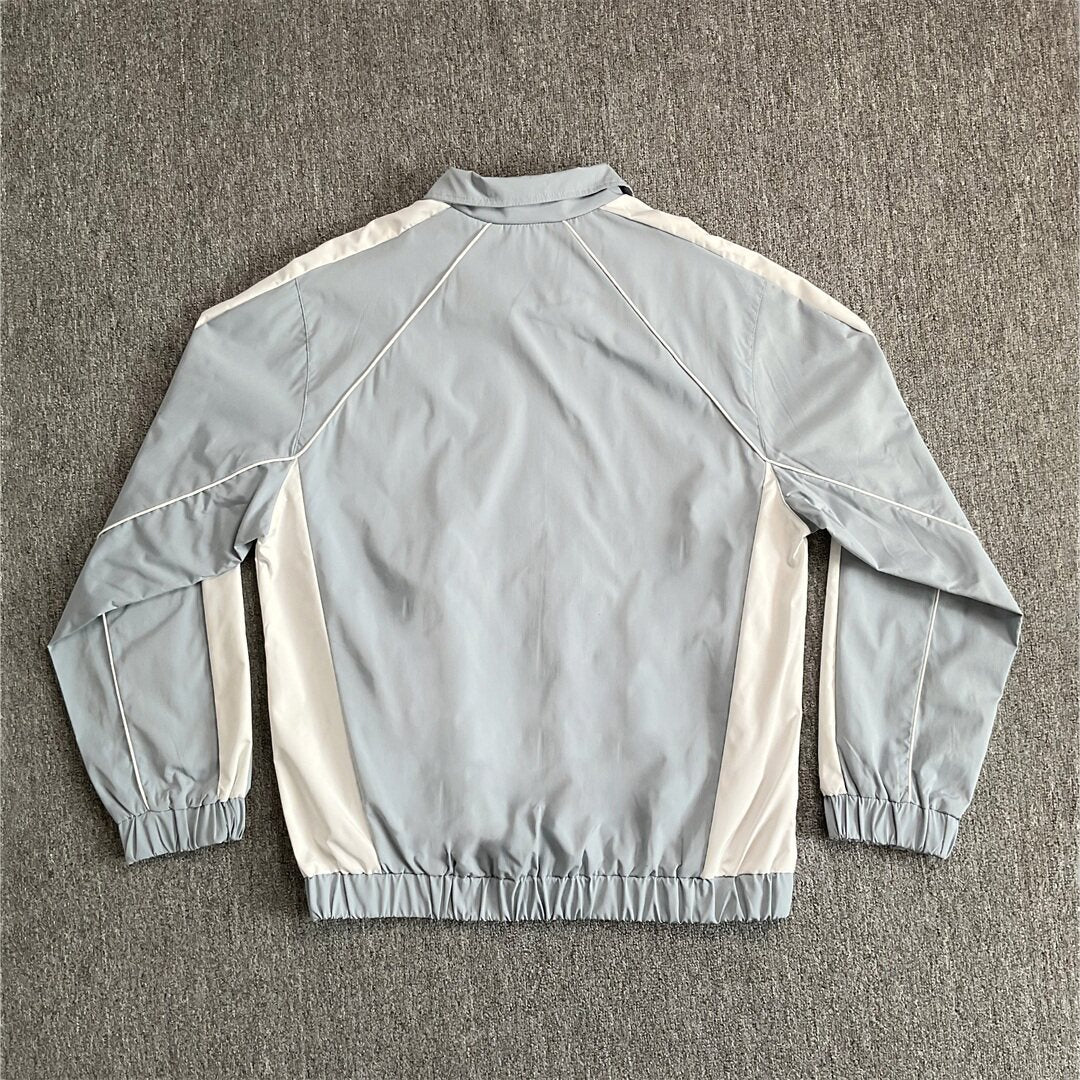 Rhude Contrasting color sportswear with zippers